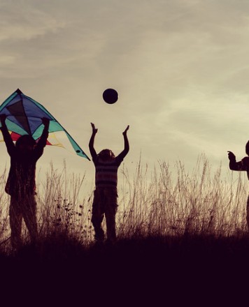 Happy,Children,Silhouette,With,Kite,,Ball,And,Paper,Airplane